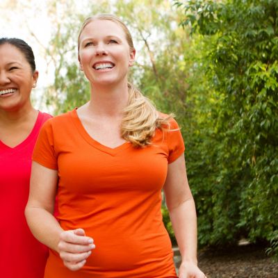 Fit woman walking and exercising.