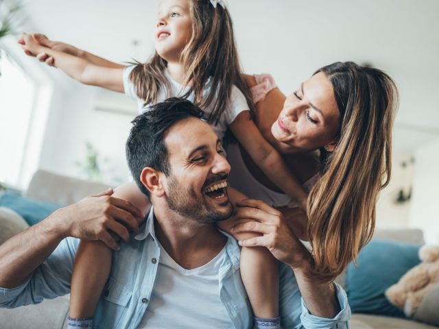 Happy family having fun time together at home